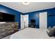 Bedroom with a gray carpet, a queen bed, and lots of natural light at 2003 Pilot Mountain Ct, Apex, NC 27502