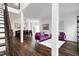 Spacious living area with hardwood floors, stylish furnishings, and plenty of natural light at 2003 Pilot Mountain Ct, Apex, NC 27502