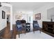 Open living space with hardwood floors, dining area, and comfortable seating at 2003 Pilot Mountain Ct, Apex, NC 27502