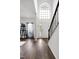 Bright, open-concept living room boasts hardwood flooring and a welcoming atmosphere at 2003 Pilot Mountain Ct, Apex, NC 27502