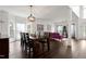 Open living space with dining area and modern furniture at 2003 Pilot Mountain Ct, Apex, NC 27502