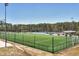 Community athletic field with green turf, fences, and various sports facilities at 2003 Pilot Mountain Ct, Apex, NC 27502