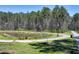Picturesque walking trails winding through a serene park, offering a peaceful retreat at 2003 Pilot Mountain Ct, Apex, NC 27502