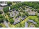 Community aerial shot featuring pool, mature landscaping, and convenient resident parking at 202 Oak Tree Dr, Chapel Hill, NC 27517