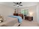 Neutral bedroom with lots of space, ceiling fan and light at 202 Oak Tree Dr, Chapel Hill, NC 27517