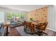 Dining area with hardwood floors and view of the backyard at 202 Oak Tree Dr, Chapel Hill, NC 27517