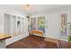 Welcoming entryway with storage, hardwood floors, and access to the main living areas at 202 Oak Tree Dr, Chapel Hill, NC 27517