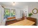 Bright entryway featuring lots of natural light, wood floors and coat rack at 202 Oak Tree Dr, Chapel Hill, NC 27517
