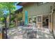 Outdoor patio area with table, chairs and easy access to a covered outdoor space at 202 Oak Tree Dr, Chapel Hill, NC 27517