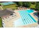 Community pool area with ample seating, providing a relaxing and enjoyable outdoor space for residents at 2030 Prairie Ridge Ct, Fuquay Varina, NC 27526