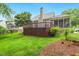 Spacious deck overlooking a well-maintained backyard, ideal for enjoying outdoor living and entertaining guests at 2030 Prairie Ridge Ct, Fuquay Varina, NC 27526