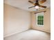 Bedroom featuring neutral walls, carpet floors, a ceiling fan, and a sunny window at 2030 Prairie Ridge Ct, Fuquay Varina, NC 27526