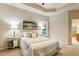 Bedroom features neutral colors, plush carpeting and a trey ceiling with recessed lights at 2030 Prairie Ridge Ct, Fuquay Varina, NC 27526