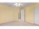 Bright bedroom featuring neutral walls and carpet flooring at 2030 Prairie Ridge Ct, Fuquay Varina, NC 27526