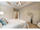 Serene bedroom with trey ceiling, neutral palette, and soft carpeting at 2030 Prairie Ridge Ct, Fuquay Varina, NC 27526
