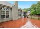 Spacious wooden deck with access to the home and screened-in porch at 2030 Prairie Ridge Ct, Fuquay Varina, NC 27526