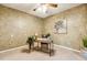 Office with textured wallpaper, ceiling fan, and carpeted floors. Perfect for work or study at 2030 Prairie Ridge Ct, Fuquay Varina, NC 27526