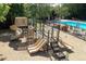 Large playground area with multiple slides, climbing structures, and shade at 2030 Prairie Ridge Ct, Fuquay Varina, NC 27526
