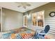 Cozy screened porch with views through to the kitchen through a window at 2030 Prairie Ridge Ct, Fuquay Varina, NC 27526