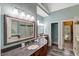 Primary bathroom features double vanities, tiled floors, and separate shower and soaking tub at 204 Middlestone Ct, Wake Forest, NC 27587