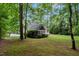 Charming home surrounded by lush greenery and a well-manicured lawn at 204 Middlestone Ct, Wake Forest, NC 27587