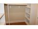 Walk-in closet includes custom storage, multiple shelves, and hanging space at 2112 Coy St, Burlington, NC 27215