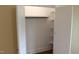 Spacious white closet with shelving and hanging rack for optimal storage in the home at 2112 Coy St, Burlington, NC 27215