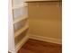Spacious walk-in closet with custom shelving units and ample storage space at 2112 Coy St, Burlington, NC 27215