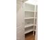 A pantry with white shelves to store household items at 2112 Coy St, Burlington, NC 27215