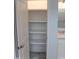 Walk-in pantry featuring adjustable shelving for maximum storage and organization at 2112 Coy St, Burlington, NC 27215