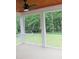 Covered porch with a ceiling fan and railings at 2112 Coy St, Burlington, NC 27215
