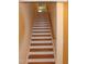 Classic wooden staircase with white risers, leading to the next level of the home at 2112 Coy St, Burlington, NC 27215