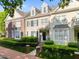 Charming townhome with a manicured lawn, brick accents, and a welcoming front porch with brick steps at 2503 Saint Pauls Sq, Raleigh, NC 27614