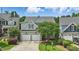 Charming two-story home with a well-manicured lawn and a two-car garage at 2721 Cameron Pond Dr, Cary, NC 27519