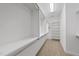 Large walk-in closet with custom shelving for optimal organization and storage space at 2721 Cameron Pond Dr, Cary, NC 27519