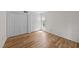 Bright bedroom offers neutral walls, new floor and closet at 2821 Edridge Ct, Raleigh, NC 27612