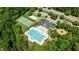 Overhead shot of a community center featuring a swimming pool, clubhouse, tennis court and playground at 303 Middleham Dr, Rolesville, NC 27571