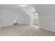Large, carpeted bedroom with ample natural light, neutral paint and architectural detail at 303 Middleham Dr, Rolesville, NC 27571