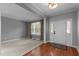 Entryway featuring a classic white front door and neutral-toned walls at 303 Middleham Dr, Rolesville, NC 27571