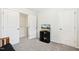Bedroom with carpet, large closet, and a TV on a stand at 307 W Copenhaver Dr, Clayton, NC 27527