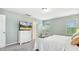 Bedroom featuring a bed, dresser, and a large mirror at 307 W Copenhaver Dr, Clayton, NC 27527