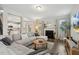 Inviting living room with cozy fireplace and modern decor, perfect for relaxation and entertaining at 307 W Copenhaver Dr, Clayton, NC 27527