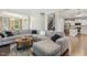 Open concept design with the kitchen visible from the living room, showcasing natural light and an open floor plan at 307 W Copenhaver Dr, Clayton, NC 27527