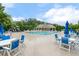 Community pool area with plentiful seating and a covered pavilion at 307 W Copenhaver Dr, Clayton, NC 27527