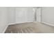 Bedroom with carpet flooring, base molding, and standard closet with sliding doors at 308 Sandy Knob Ln, Rocky Mount, NC 27803