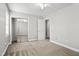 Bedroom featuring carpet floors, a window, and a mirrored sliding door closet at 308 Sandy Knob Ln, Rocky Mount, NC 27803
