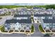New townhome community with lush green spaces, modern architecture, and well-planned street layouts at 3101 Brellon Ln, Durham, NC 27703