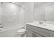 Bathroom with a bathtub and a sink with a gray vanity at 3101 Brellon Ln, Durham, NC 27703