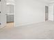 Bright bedroom featuring a large window and an open closet at 3101 Brellon Ln, Durham, NC 27703