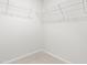 Walk-in closet with wire shelving and neutral carpet at 3101 Brellon Ln, Durham, NC 27703